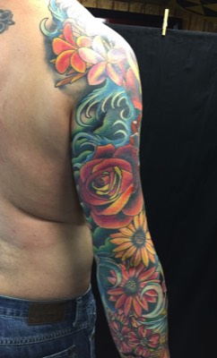  Tattooed sleeve of flowers 