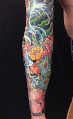  Hummingbird and flower sleeve tattoo 