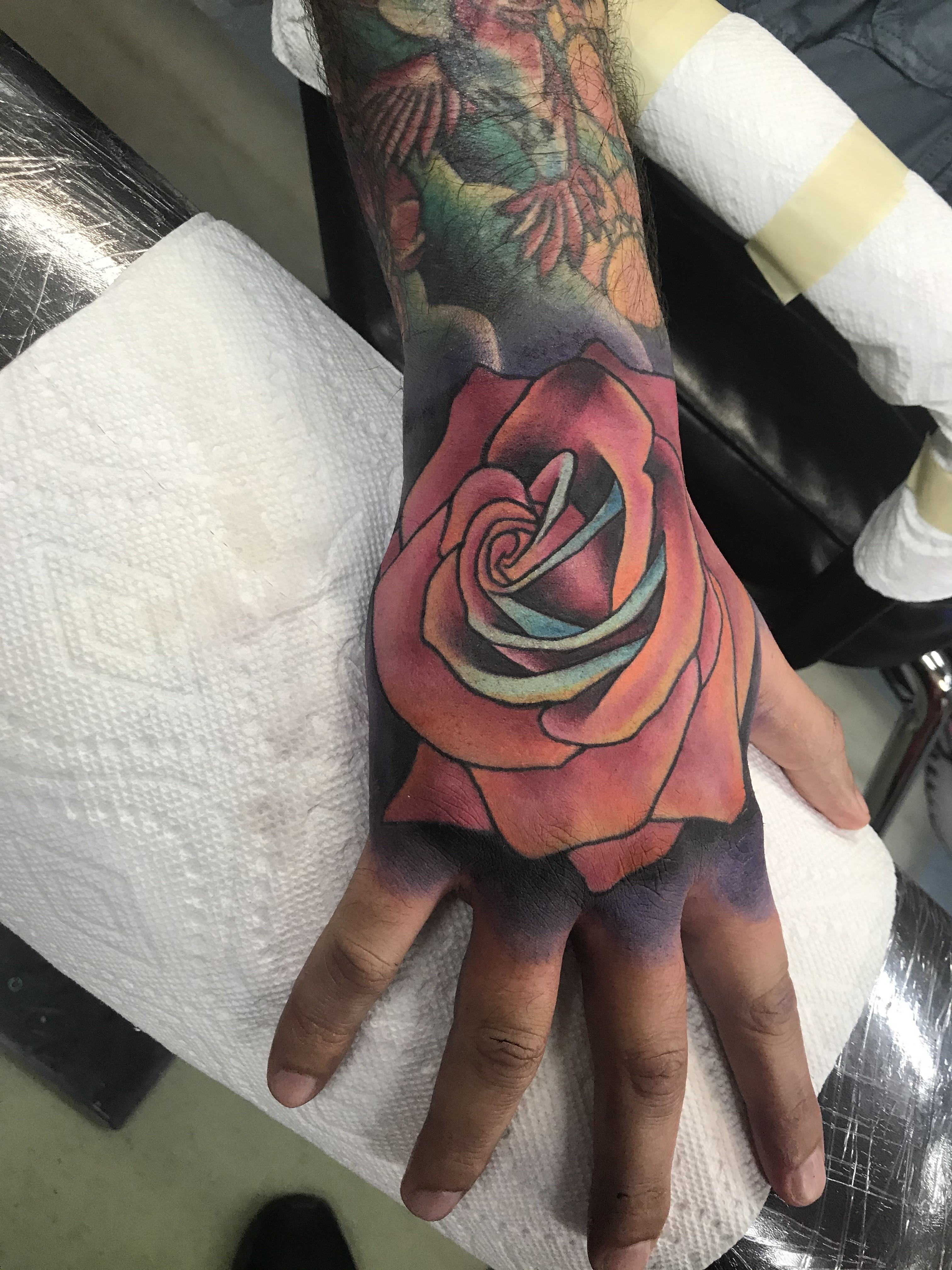  Rose hand tattoo 