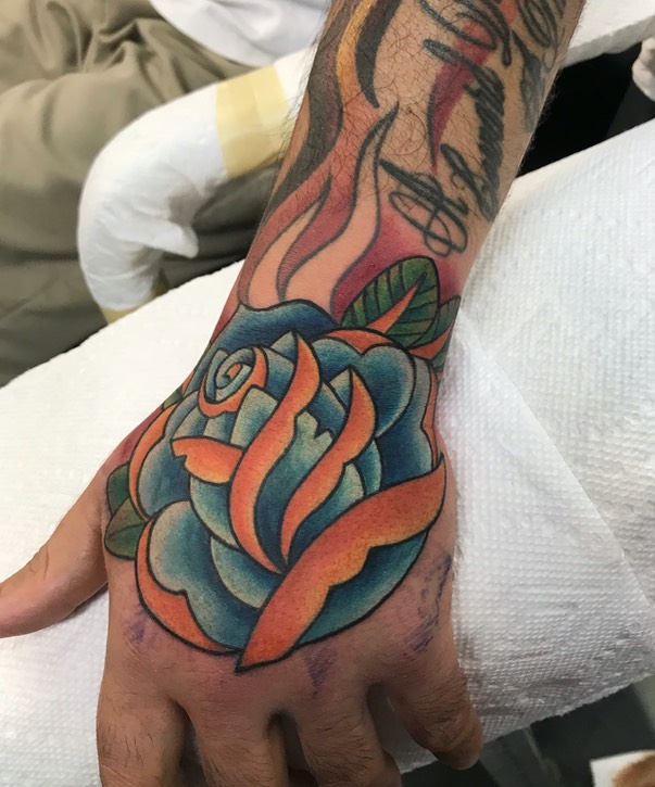  Traditional Rose hand tattoo by Brandon Notch 