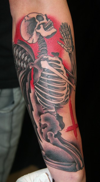  Praying skeleton tattoo 