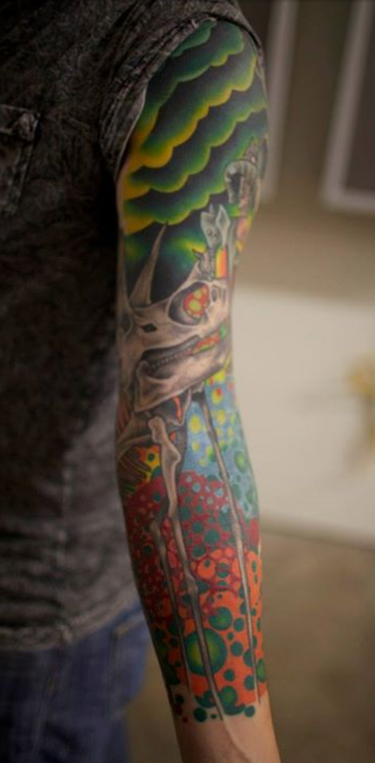  Tattooing by Brandon Notch (Salvador Dali elephant & dinosaur) 