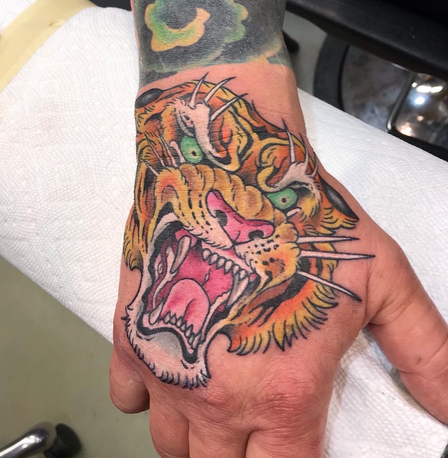  Tiger hand tattoo 