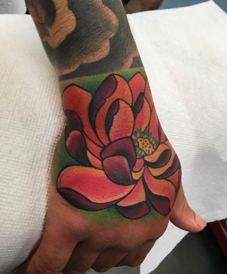  Lotus hand tattoo 