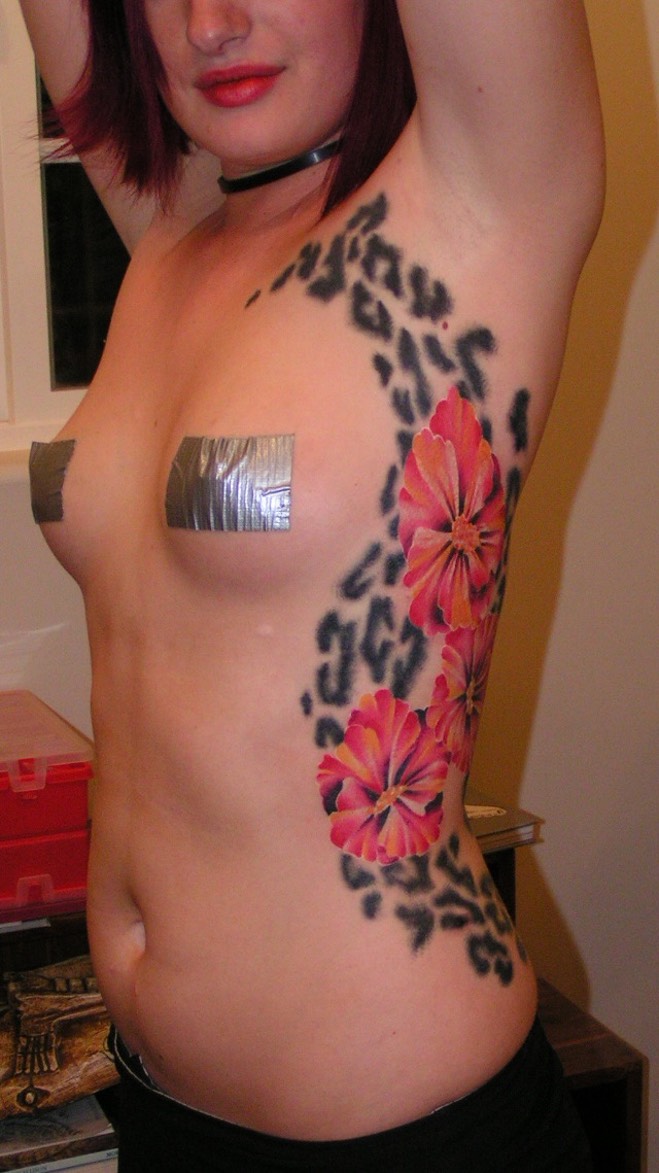  Leopard print and Hibiscus flowers tattoo 