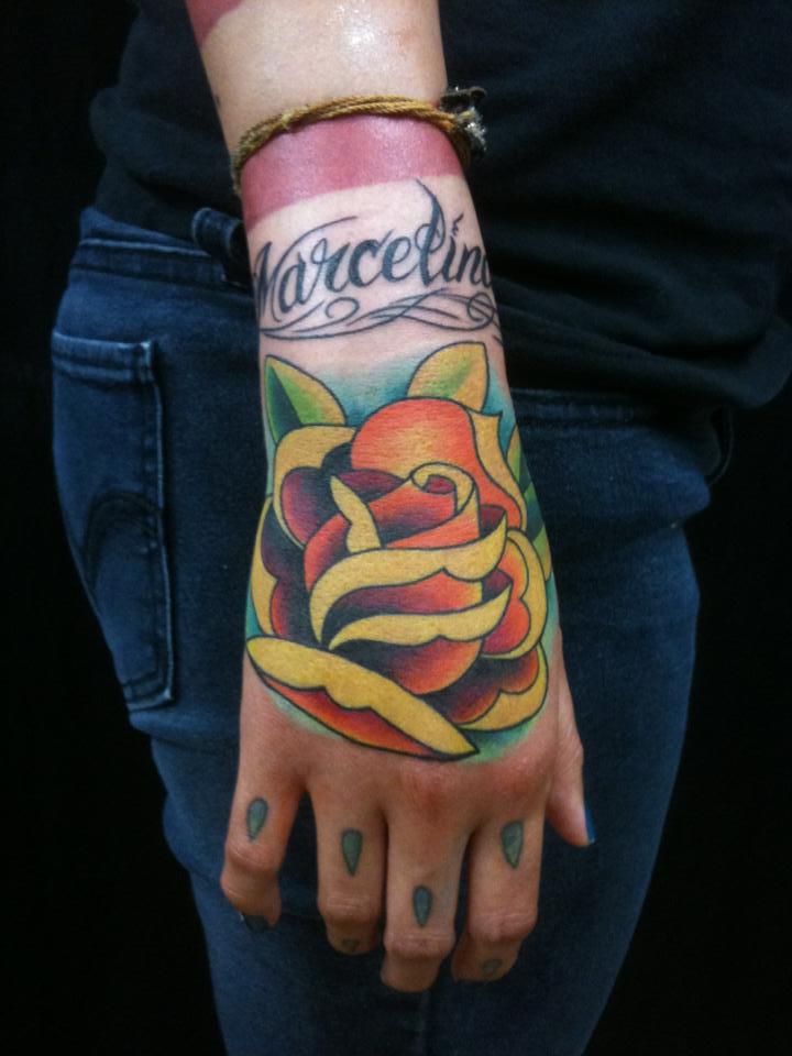  Hand rose tattoo by Brandon Notch 