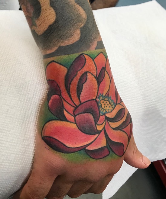  Lotus hand tattoo 