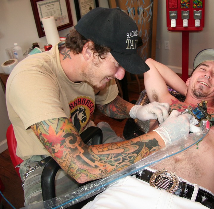  Brandon Notch tattooing a chest panel 