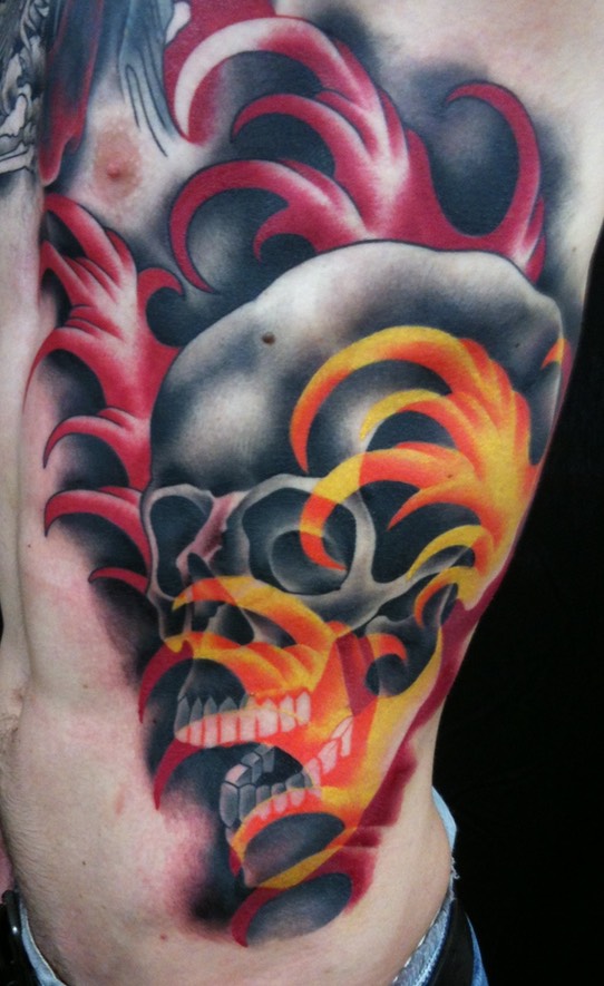  Skull with firewater tattoo  