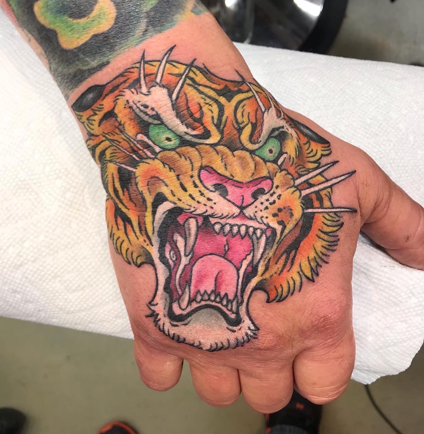  Tiger hand tattoo by Brandon Notch 